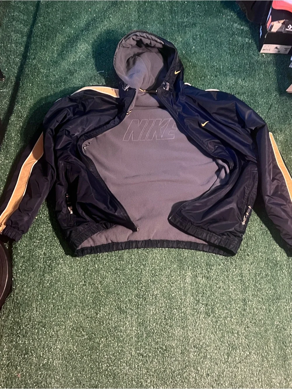 Nike Men’s Navy Windbreaker Jacket with Gold Stripe Accents